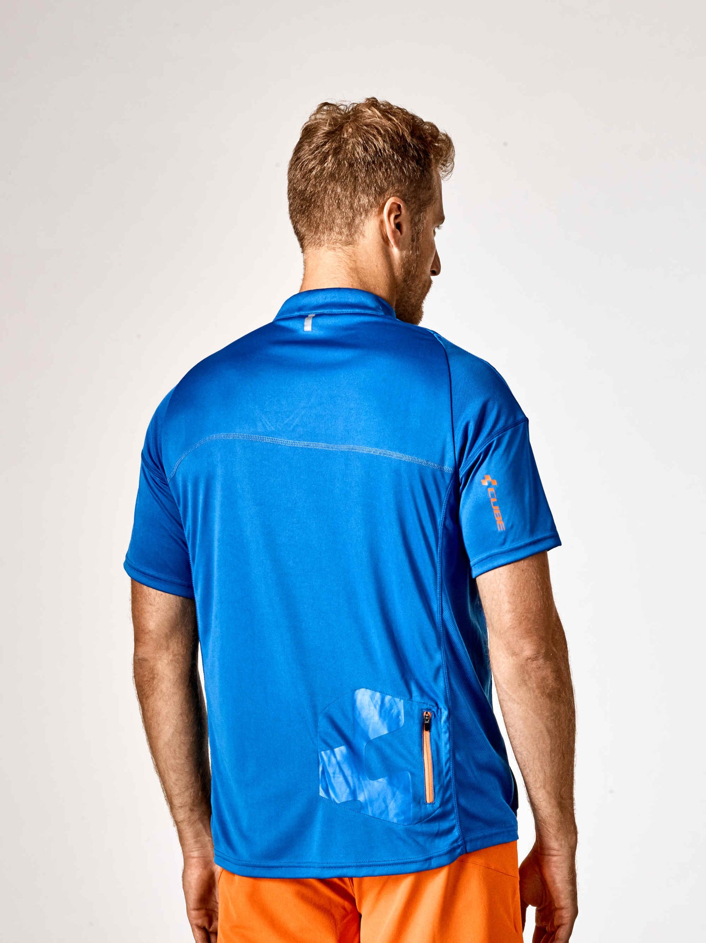 Camiseta de cuello redondo CUBE Motion de manga corta, color azul y naranja